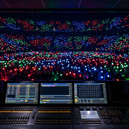 grandMA3 lighting console controlling Nex Tech LED wristbands at a live show